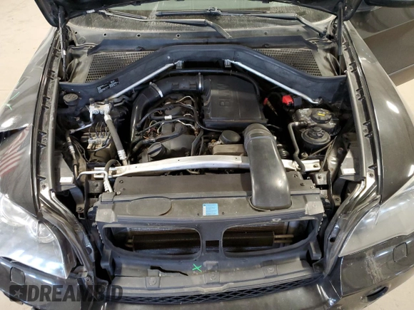 2011 BMW X5 35i z VIN 5UXZV4C52BL743475, wystawiony jako Copart lot #56238615 z przebiegiem 218 738 mil mil oraz Szkoda całkowita • Salvage title. Historia ofert i sprzedaży dostępna na DreamBid. Obrazek 12.