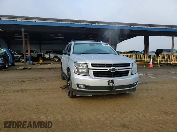2019 Chevrolet Tahoe Premier with VIN 1GNSKCKJ9KR205249, listed as a Copart auction lot 41647065 with 46,854 mi miles and Salvage title. Bid and sale history available at DreamBid. Image 12.