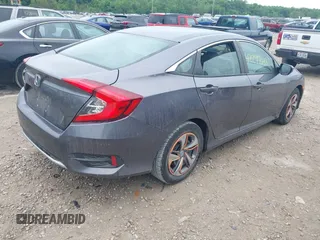 2020 Honda Civic LX z VIN 19XFC2F66LE012481, wystawiony jako IAAI lot #42297600 z przebiegiem 56 602 mil mil oraz . Historia ofert i sprzedaży dostępna na DreamBid. Obrazek 4.