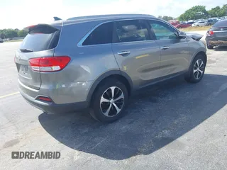 2016 Kia Sorento EX with VIN 5XYPH4A16GG126700, listed as a IAAI auction lot 41557828 with 130,102 mi miles. Bid and sale history available at carsss.com. Image 4.