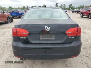 2013 Volkswagen Jetta SE with VIN 3VWDX7AJXDM400161, listed as a Copart auction lot 53249335 with 104,882 mi miles and Salvage title. Bid and sale history available at DreamBid. Image 6.