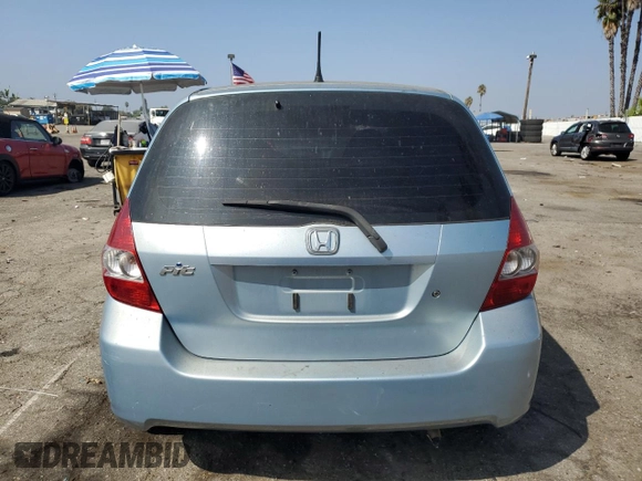 2007 Honda Fit with VIN JHMGD37477S055538, listed as a Copart auction lot 73222124 with 125,205 mi miles and Salvage Title. Bid and sale history available at carsss.com. Image 6.