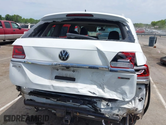 2021 Volkswagen Atlas SEL with VIN 1V2BR2CA4MC541523, listed as a IAAI auction lot 42326498 with 84,090 mi miles and . Bid and sale history available at DreamBid. Image 6.