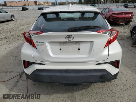 2019 Toyota C-HR XLE z VIN NMTKHMBX7KR073500, wystawiony jako Copart lot #53596395 z przebiegiem 91 934 mil mil oraz Szkoda całkowita • Salvage title. Historia ofert i sprzedaży dostępna na DreamBid. Obrazek 6.