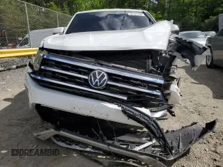 2021 Volkswagen Atlas SE z VIN 1V2LP2CA3MC513383, wystawiony jako Copart lot #56131345 z przebiegiem 75 230 mil mil oraz Szkody całkowita. Historia ofert i sprzedaży dostępna na DreamBid. Obrazek 5.