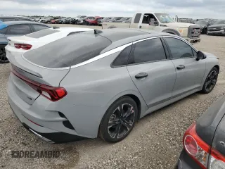 2022 Kia K5 GT-Line z VIN 5XXG64J21NG159779, wystawiony jako Copart lot #51982075 z przebiegiem 45 264 mil mil oraz Szkoda całkowita • Salvage title. Historia ofert i sprzedaży dostępna na DreamBid. Obrazek 3.