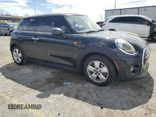 2019 MINI Hardtop Cooper with VIN WMWXP5C5XK2H29936, listed as a Copart auction lot 56713285 with 80,303 mi miles and Salvage title. Bid and sale history available at DreamBid. Image 4.