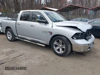 2014 Ram 1500 Big Horn with VIN 1C6RR7LM1ES370977, listed as a IAAI auction lot 41037510 with 145,692 mi miles and . Bid and sale history available at DreamBid. Image 1.