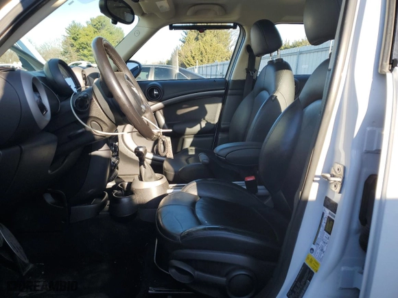 2012 MINI Cooper Countryman S with VIN WMWZC3C51CWM27029, listed as a Copart auction lot 49992685 with 58,316 mi miles and Salvage Title. Bid and sale history available at carsss.com. Image 7.