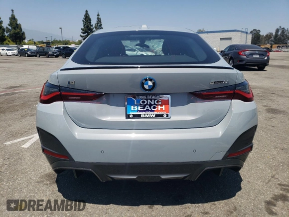 2024 BMW i4 eDrive35 with VIN WBY43AW06RFS94891, listed as a Copart auction lot 57983274 with 1,099 mi miles and Salvage Title. Bid and sale history available at carsss.com. Image 6.