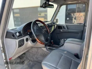2002 Mercedes-Benz G-Class with VIN WDCYR49EX2X128555, listed as a Copart auction lot 77047164 with 222,979 mi miles and Salvage Title. Bid and sale history available at carsss.com. Image 5.
