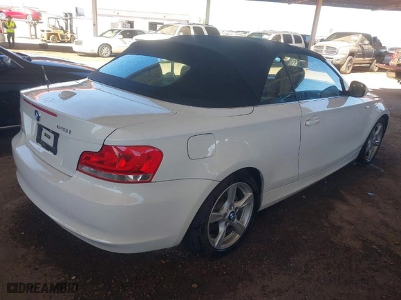 2013 BMW 1 Series 128i with VIN WBAUN1C55DVR01404, listed as a IAAI auction lot 41682695 with 100,948 mi miles. Bid and sale history available at carsss.com. Image 4.