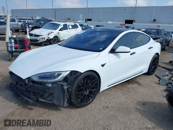 2016 Tesla Model S 70 z VIN 5YJSA1E11GF159425, wystawiony jako IAAI lot #42377639 z przebiegiem 79 767 mil mil oraz . Historia ofert i sprzedaży dostępna na DreamBid. Obrazek 2.