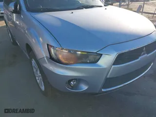 2010 Mitsubishi Outlander SE with VIN JA4AS3AW4AZ009939, listed as a IAAI auction lot 41689188 with 144,480 mi miles. Bid and sale history available at carsss.com. Image 6.