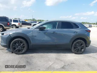 2023 Mazda CX-30 S Carbon Edition with VIN 3MVDMBCM4PM579080, listed as a IAAI auction lot 41941082 with 5,444 mi miles and . Bid and sale history available at carsss.com. Image 14.
