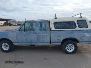 1991 Ford F-150 with VIN 1FTEX14Y8MKA33233, listed as a IAAI auction lot 41572967 with 44,300 mi miles. Bid and sale history available at carsss.com. Image 6.