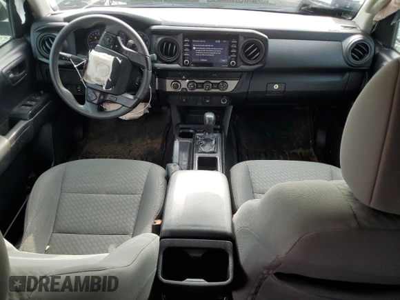 2020 Toyota Tacoma SR5 with VIN 3TMCZ5AN0LM299243, listed as a Copart auction lot 58818825 with 76,449 mi miles and Salvage title. Bid and sale history available at DreamBid. Image 8.