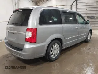 2013 Chrysler Town & Country Touring with VIN 2C4RC1BG0DR775313, listed as a IAAI auction lot 41738917 with 209,378 mi miles. Bid and sale history available at carsss.com. Image 4.