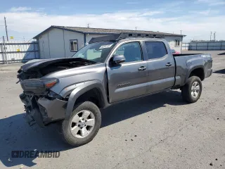 2018 Toyota Tacoma SR5 with VIN 3TMDZ5BN9JM043361, listed as a Copart auction lot 65269105 with 162,953 mi miles and Salvage title. Bid and sale history available at DreamBid. Image 1.