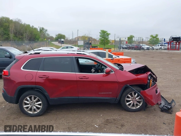 2014 Jeep Cherokee Limited z VIN 1C4PJMDB9EW281248, wystawiony jako IAAI lot #42180172 z przebiegiem 153 777 mil mil oraz . Historia ofert i sprzedaży dostępna na DreamBid. Obrazek 14.