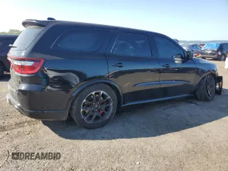 2023 Dodge Durango SRT Hellcat Premium z VIN 1C4SDJH93PC584831, wystawiony jako Copart lot #68612584 z przebiegiem 7 379 mil mil oraz Szkoda całkowita • Salvage title. Historia ofert i sprzedaży dostępna na DreamBid. Obrazek 3.
