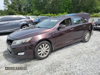 2014 Kia Optima EX z VIN 5XXGN4A79EG304534, wystawiony jako Copart lot #55034555 z przebiegiem 185 692 mil mil oraz Szkoda całkowita • Salvage title. Historia ofert i sprzedaży dostępna na DreamBid. Obrazek 1.