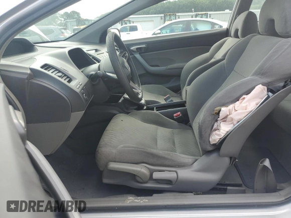 2009 Honda Civic Cpe LX with VIN 2HGFG12629H521583, listed as a Copart auction lot 66502414 with 136,478 mi miles and Salvage Title. Bid and sale history available at carsss.com. Image 7.