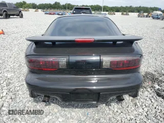 1995 Pontiac Firebird Trans Am z VIN 2G2FV22P8S2251923, wystawiony jako Copart lot #54007135 z przebiegiem 35 218 mil mil oraz Szkody całkowita. Historia ofert i sprzedaży dostępna na DreamBid. Obrazek 6.