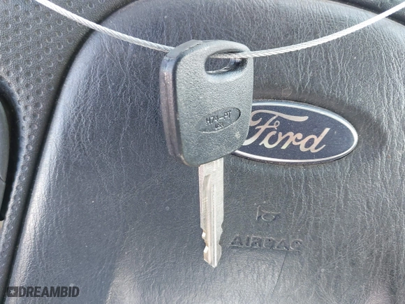 2004 Ford Escape XLT with VIN 1FMCU03134KA96184, listed as a IAAI auction lot 41917091 with 246,067 mi miles. Bid and sale history available at carsss.com. Image 11.