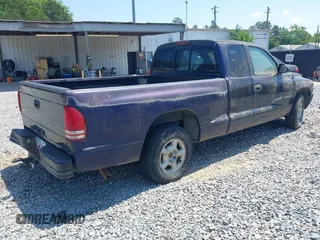 1998 Dodge Dakota SLT with VIN 1B7GL22X3WS569885, listed as a IAAI auction lot 42128994 with 1 mi miles. Bid and sale history available at carsss.com. Image 4.