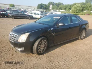 2013 Cadillac CTS Premium с VIN 1G6DS5E30D0162117, выставлен на аукционе Copart как лот 64612245 с пробегом 136 561 миль миль и Чистый • Clean title. История ставок и продаж доступна на DreamBid. Изображение 1.