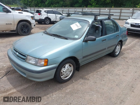 1994 Toyota Tercel DX z VIN JT2EL43T5R0418778, wystawiony jako IAAI lot #42269331 z przebiegiem 166 511 mil mil oraz . Historia ofert i sprzedaży dostępna na DreamBid. Obrazek 2.