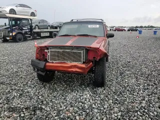 1999 Jeep Cherokee Sport with VIN 1J4FF68S7XL560943, listed as a Copart auction lot 58425505 with 68,654 mi miles and Salvage title. Bid and sale history available at DreamBid. Image 15.