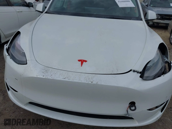2023 Tesla Model Y Long Range with VIN 7SAYGDEE2PF765395, listed as a IAAI auction lot 41688080 with 27,792 mi miles and . Bid and sale history available at DreamBid. Image 20.