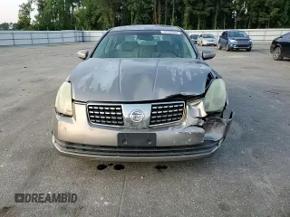 2004 Nissan Maxima SE with VIN 1N4BA41E24C878448, listed as a Copart auction lot 72596984 with 329,525 mi miles and Salvage Title. Bid and sale history available at carsss.com. Image 11.