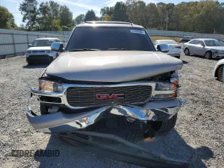 2006 GMC Yukon SLT with VIN 1GKEK13T96J110533, listed as a Copart auction lot 77797364 with 209,339 mi miles and Salvage Title. Bid and sale history available at carsss.com. Image 5.