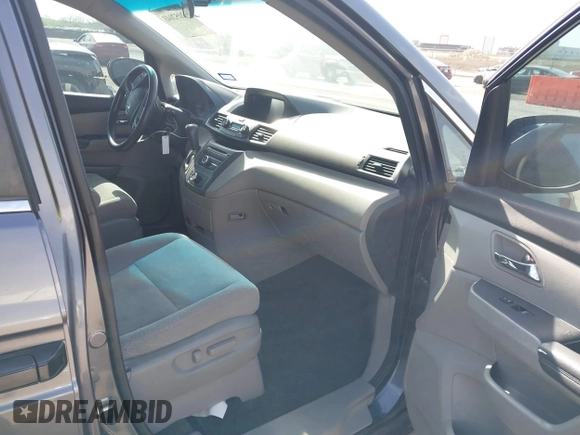 2015 Honda Odyssey LX with VIN 5FNRL5H29FB032327, listed as a IAAI auction lot 42052043 with 153,365 mi miles and . Bid and sale history available at DreamBid. Image 5.