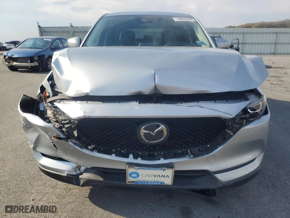 2020 Mazda CX-5 Touring with VIN JM3KFACMXL0766115, listed as a Copart auction lot 78695344 with 71,850 mi miles and Salvage Title. Bid and sale history available at carsss.com. Image 5.