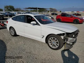 2014 BMW 3 Series 328i Gran Turismo xDrive with VIN WBA3X5C57ED242679, listed as a Copart auction lot 48598665 with 69,712 mi miles and Salvage title. Bid and sale history available at DreamBid. Image 4.