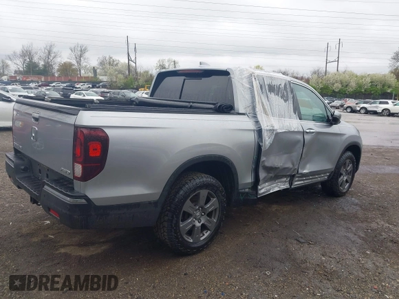 2020 Honda Ridgeline RTL-E with VIN 5FPYK3F73LB004365, listed as a IAAI auction lot 41965887 with 80,981 mi miles and . Bid and sale history available at DreamBid. Image 17.