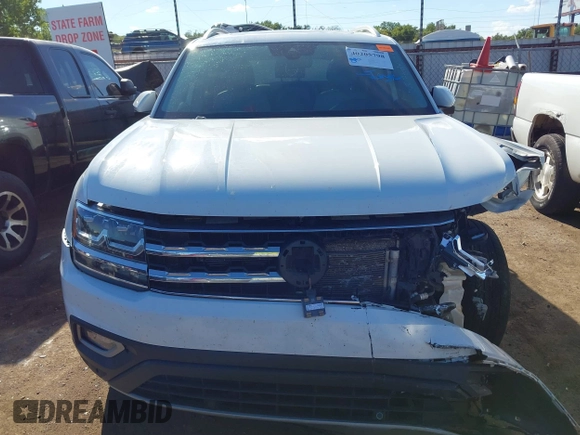 2018 Volkswagen Atlas SEL z VIN 1V2MR2CA3JC536009, wystawiony jako IAAI lot #40205798 z przebiegiem 125 945 mil mil oraz . Historia ofert i sprzedaży dostępna na DreamBid. Obrazek 13.