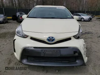 2016 Toyota Prius v Two with VIN JTDZN3EU4GJ052404, listed as a Copart auction lot 50958515 with 221,170 mi miles and Salvage Title. Bid and sale history available at carsss.com. Image 5.