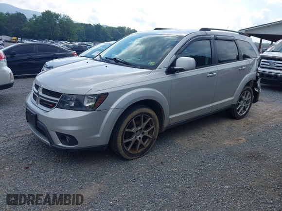 2014 Dodge Journey R/T with VIN 3C4PDDEG7ET139410, listed as a IAAI auction lot 42808542 with 185,712 mi miles and . Bid and sale history available at DreamBid. Image 2.