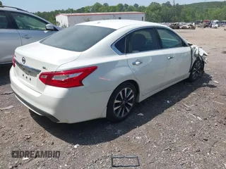 2016 Nissan Altima SR with VIN 1N4AL3AP9GC136005, listed as a IAAI auction lot 42041717 with 136,594 mi miles and . Bid and sale history available at DreamBid. Image 4.