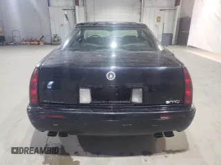 2000 Cadillac Eldorado Touring ETC z VIN 1G6ET1294YU144883, wystawiony jako Copart lot #80979854 z przebiegiem 89 271 mil mil oraz Czysty tytuł • Clean title. Historia ofert i sprzedaży dostępna na DreamBid. Obrazek 6.