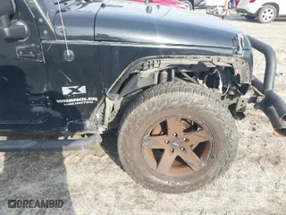 2008 Jeep Wrangler Unlimited X with VIN 1J4GA39148L648910, listed as a IAAI auction lot 41790678 with 93,528 mi miles. Bid and sale history available at carsss.com. Image 6.