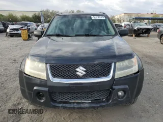 2007 Suzuki Grand Vitara XSport with VIN JS3TD944974201645, listed as a Copart auction lot 52810205 with 254,761 mi miles and Salvage title. Bid and sale history available at DreamBid. Image 5.