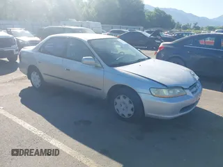 2000 Honda Accord LX z VIN JHMCG5545YC040830, wystawiony jako IAAI lot #42466649 z przebiegiem 241 097 mil mil oraz . Historia ofert i sprzedaży dostępna na DreamBid. Obrazek 1.