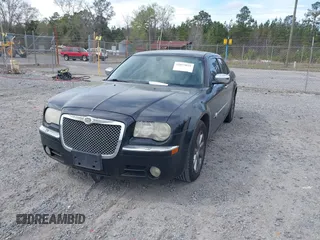 2006 Chrysler 300 C with VIN 2C3KA63H36H455735, listed as a IAAI auction lot 41875033 with 175,251 mi miles. Bid and sale history available at carsss.com. Image 2.