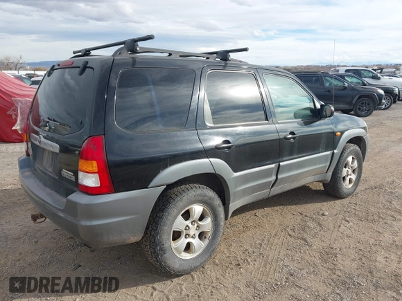 2001 Mazda Tribute LX with VIN 4F2CU08191KM27990, listed as a IAAI auction lot 41487001 with 209,394 mi miles and . Bid and sale history available at carsss.com. Image 4.